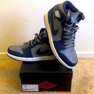 Nike Air Jordan 1 Mid. Grey/Navy Blue. Men’s size 8. Worn/couple scuffs.